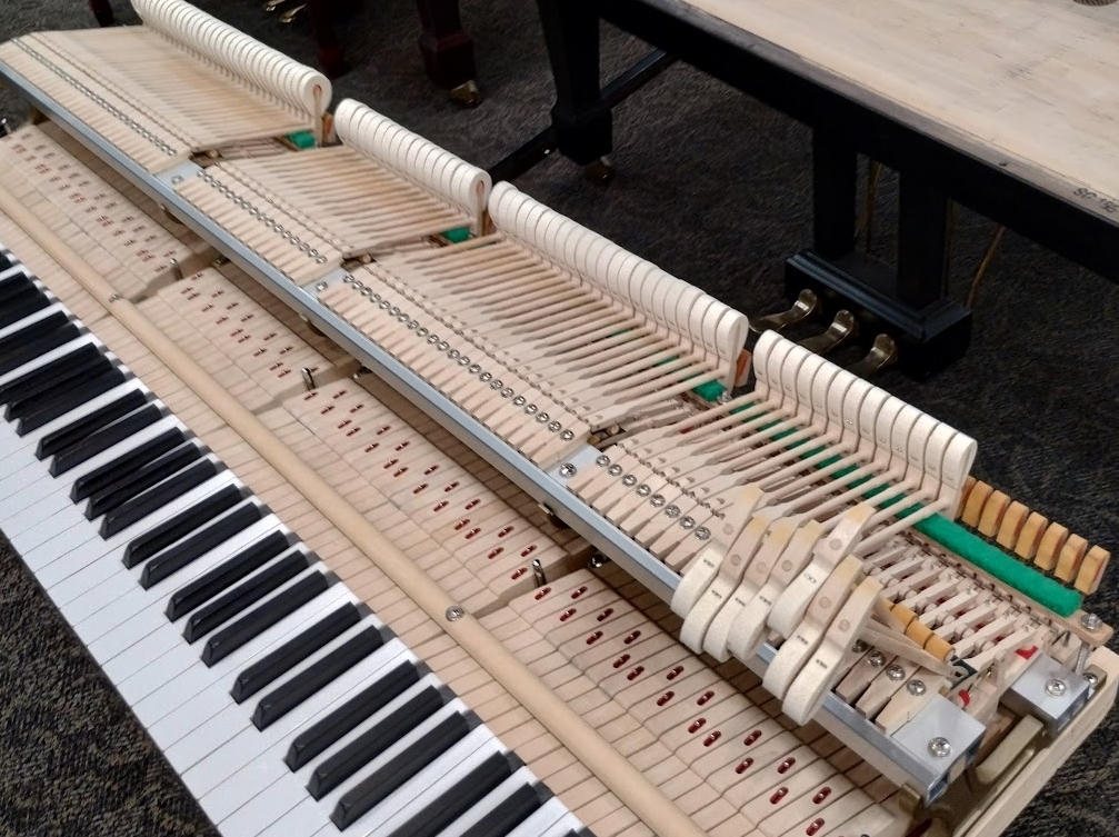 Grand piano action regulation